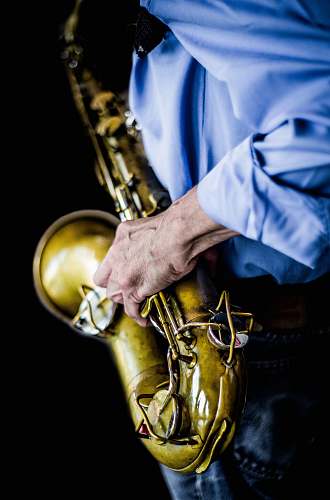musical instrument man playing saxophone leisure activities